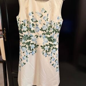 Beautiful cream satin dress with blue roses